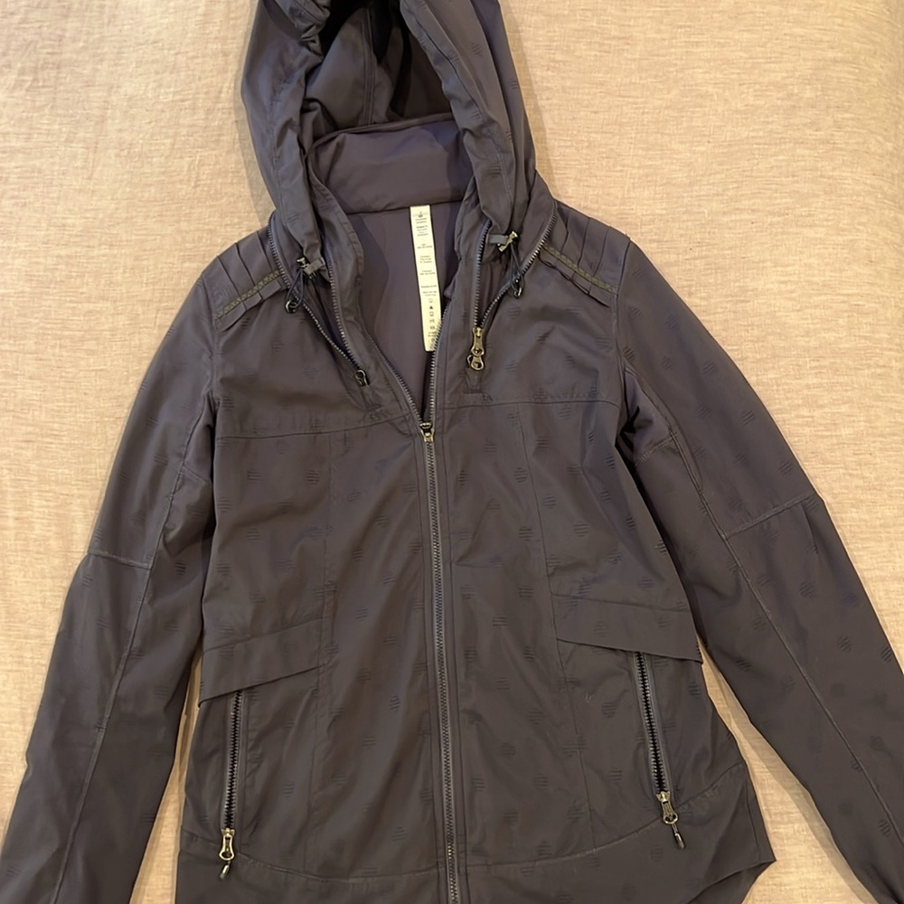 Lululemon size 2, dark blue, wind breaker with hood.